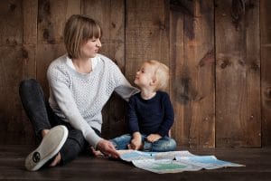 Canva Child With Woman Holding Map