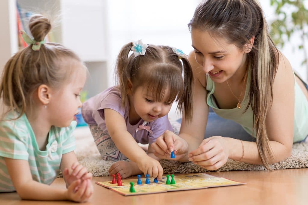 Nannies Playing Board Games